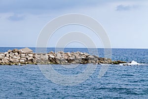 Marine rocks on Coast of Jubail in Lebanon photo