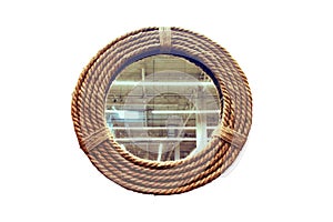 Marine round mirror on the door of the ship's cabin, isolated on a white background