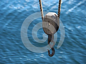 Marine sailing yachting background image of boat pulley with sea water behind