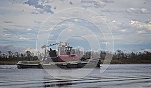 Marine tow boat or tug boat used for shipping and tranport photo