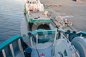 Marine vessel is morred starboard side alongside berth