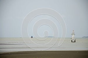 Maritime Buoyage System on the beach in the sea