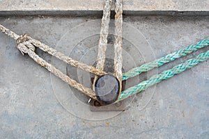 Maritime Geometry: Top-Down View of Mooring Ropes and Bollard