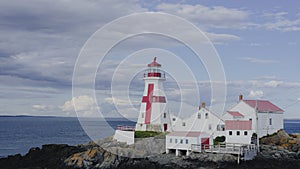 Maritime lighthouse and keeper's house on the Atlantic coast nautical