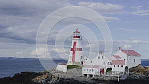 Maritime lighthouse and keeper's house on the Atlantic coast nautical photo