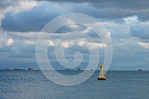 Maritime Navigation Buoy on a Cloudy Day