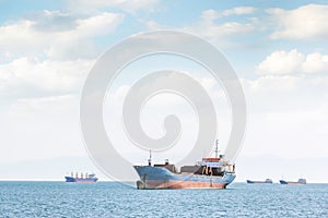 Maritime transport for cargo goods and cargo ships. A bulk carrier, bulk freighter, or colloquially, bulker is a merchant ship. photo
