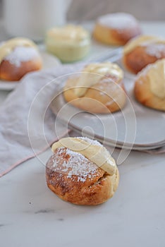 Maritozzo is italian roman breakfast sweet that whipped cream sandwished between brioche