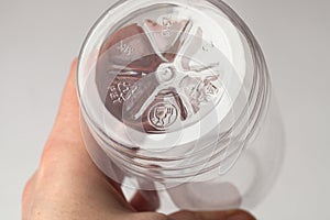 Marked bottom of a plastic transparent bottle