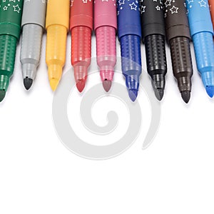 Markers colored felt pens on a white background