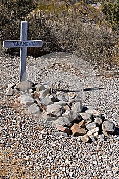 Markers and graves covered with rocks at boothill