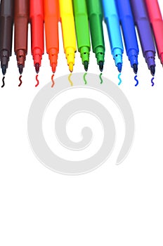 Markers pens colored top view isolated on white background