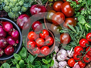 Market. Healthy vegan food. Various fresh vegetables and herbs in wooden bowls. Top view