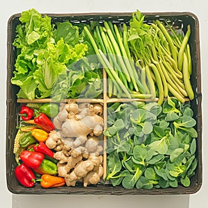 market produce basket holds organic green vegetables for sale