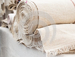 Market. rolls of linen