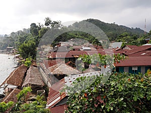 One Market roofs above Lau Bohorok river, Bukit Lawang Sumatra, Indonesia photo