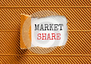 Market share symbol. Concept words Market share on beautiful white paper. Beautiful brown paper cardboard background. Business and