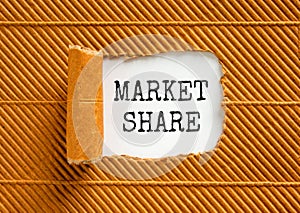 Market share symbol. Concept words Market share on beautiful white paper. Beautiful brown paper cardboard background. Business and