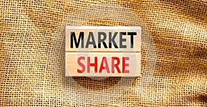 Market share symbol. Concept words Market share on beautiful wooden block. Beautiful canvas table canvas background. Business and