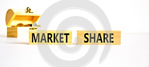 Market share symbol. Concept words Market share on beautiful wooden block. Beautiful white table white background. Wooden chest