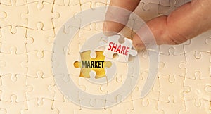 Market share symbol. Concept words Market share typed on white paper puzzles. Beautiful yellow table yellow background.