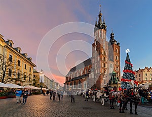 Market Square of the Old City in Krakow decorated by the christmas lights. photo