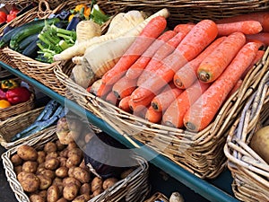 Market stall baskets full of fresh fruit and vegetables