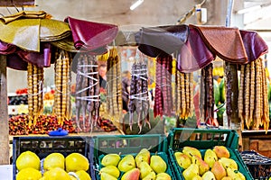 Market stall in Kutaisi Central Market (Green Bazaar, Mtsvane Bazari) with churchkhela, traditional Georgian sweets. photo