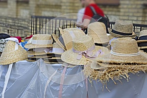 market stall with straw hats. Big group of authentic panama hats or paja toquilla hats made from straw at craft market img photo