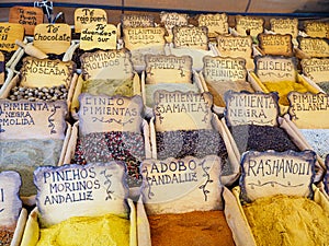 Market stand with condiments on a market in Montefrio village