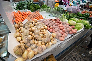 Market stand selling vegetables