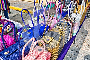 Market stands on the streets of historic city center Barrio Antiguo in Monterrey displaying authentic artisan work photo