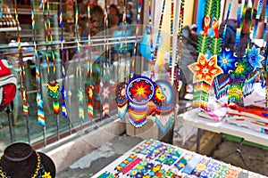 Market stands on the streets of historic city center Barrio Antiguo in Monterrey displaying authentic artisan work photo