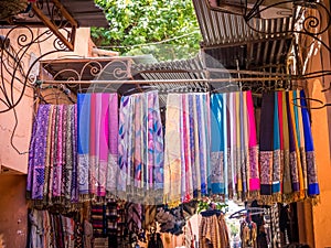 Market of traditional Moroccan scarves and shawls in vibrant colors