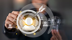 marketer selecting target customer icon with digital targeting interface, illustrating customer segmentation, personalized