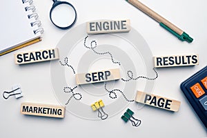 Marketing buzzword serp. Term Search engine results page on wooden blocks