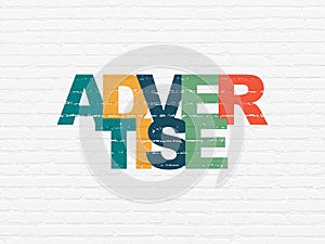 Marketing concept: Advertise on wall background