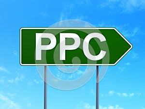 Marketing concept: PPC on road sign background