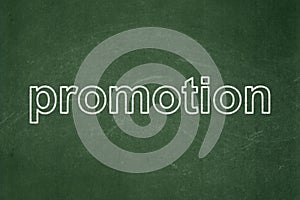 Marketing concept: Promotion on chalkboard background