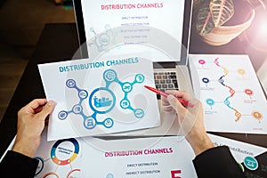 Marketing distribution channels plan on office desk