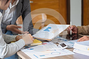 Marketing, Finance, Accounting, Planning, A team of businessmen plan with their laptops and graph charts for their profits and use
