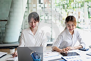 Marketing, Financial, Accounting, Planning, Team of female businessmen and economists use calculators and computers and graph