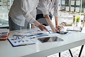 Marketing, Financial, Accounting, Planning, Team of female businessmen and economists use calculators and computers and graph