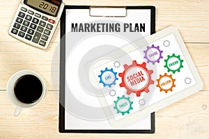 Marketing plan with social media icons, business concept