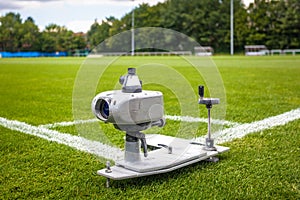 marking the corner of the football stadium with the help of a probe