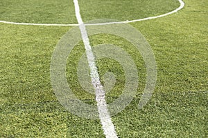 Marking of football field. White stripe on green grass. Sports stadium