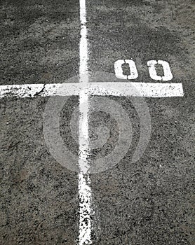 Marking lines and numbers on the asphalt surface