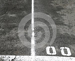 Marking lines and numbers on the asphalt surface