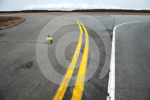 Marking yellow runway of a small airfield.