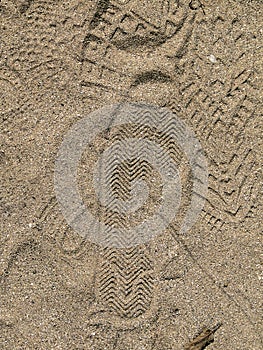 Marks from shoes on the sand